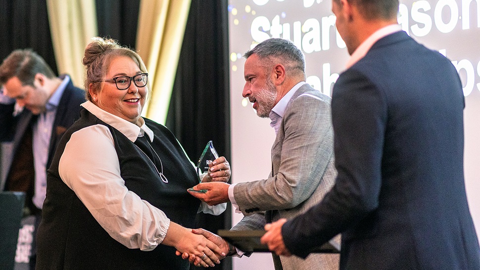 Sarah Phillips accepts award