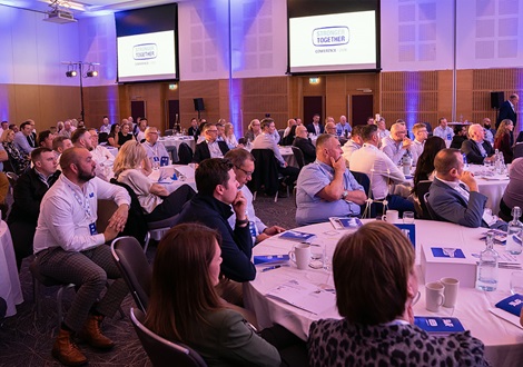 Group of people at the Stronger Together Conference